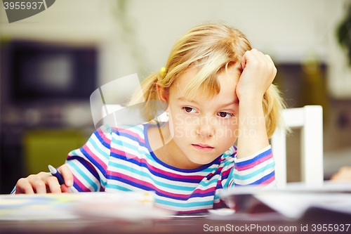 Image of Girl is doing homework 