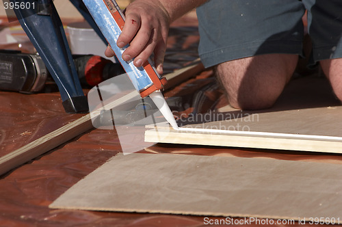 Image of Glue Gun and Wood