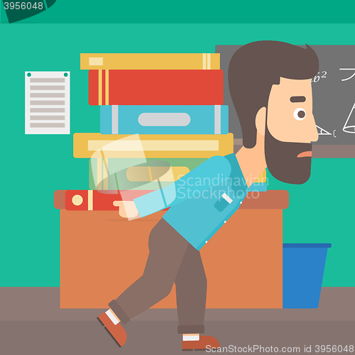 Image of Man with pile of books.
