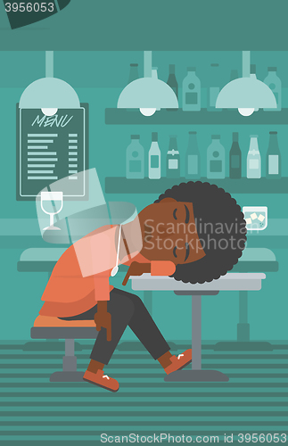 Image of Woman sleeping in bar. 