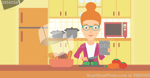 Image of Woman cooking meal.