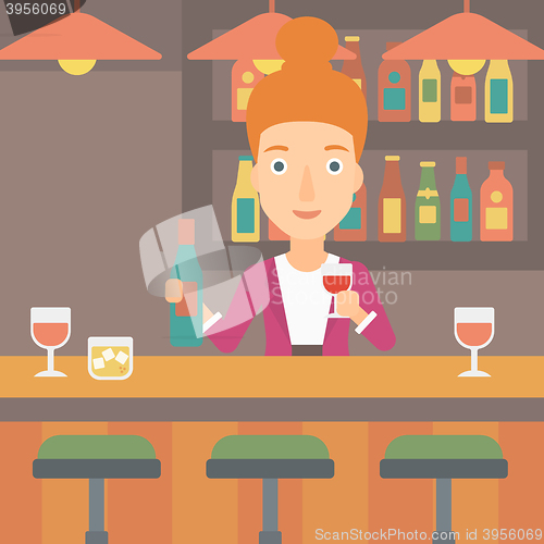 Image of Bartender standing at the bar counter.