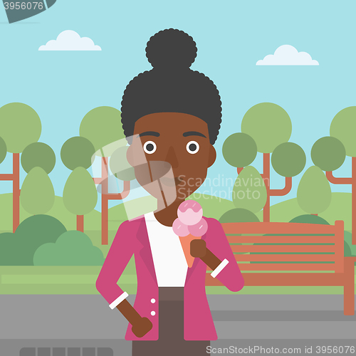 Image of Woman holding icecream.