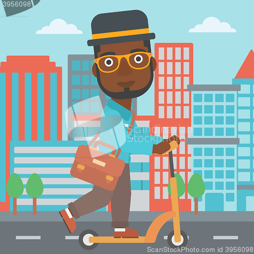 Image of Man riding on scooter.