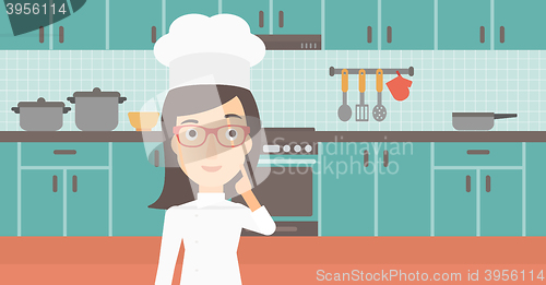 Image of Chef pointing forefinger up.
