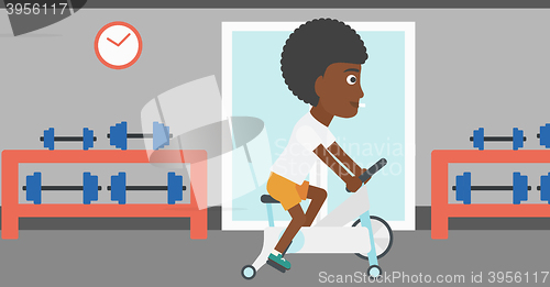Image of Woman doing cycling exercise.