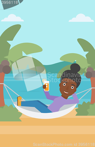 Image of Woman chilling in hammock.