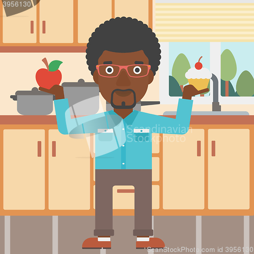 Image of Man with apple and cake.