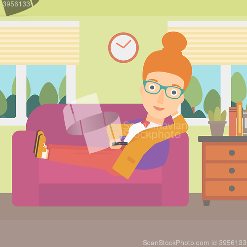 Image of Woman lying on sofa.