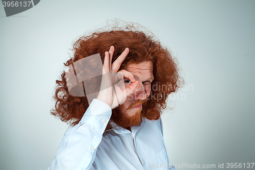 Image of The young man looking at camera