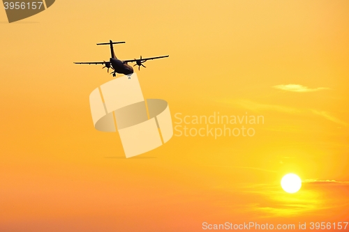 Image of Airplane at the sunset 