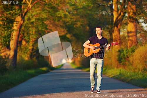 Image of Guy with guitar