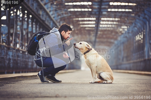 Image of Man with his dog