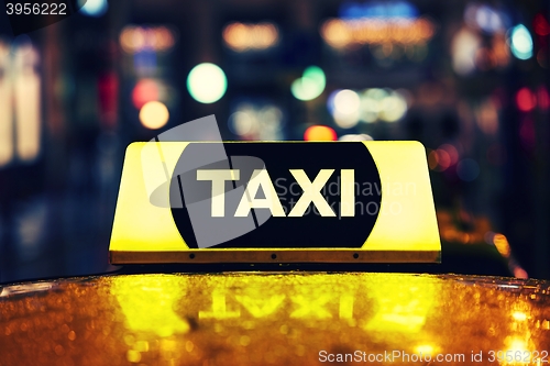 Image of Taxi car at night