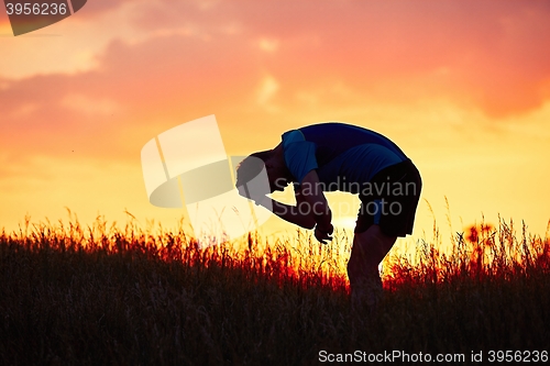 Image of Runner at the sunset