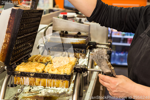 Image of Preparing homemade Belgian waffles.