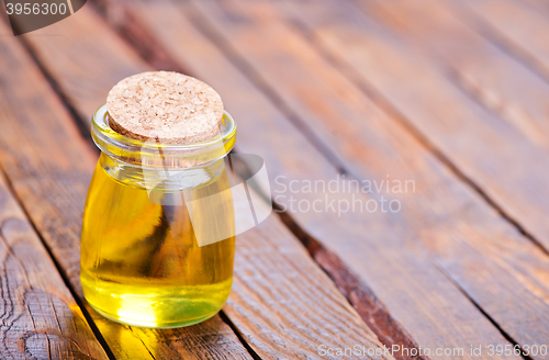 Image of oil in glass bottle