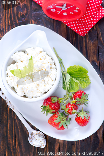 Image of cottage with strawberry