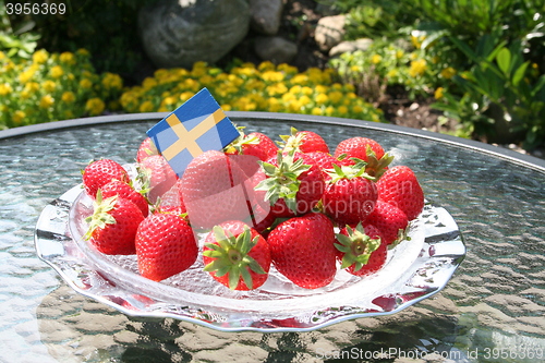 Image of Swedish strawberries for Midsummer with flag on top