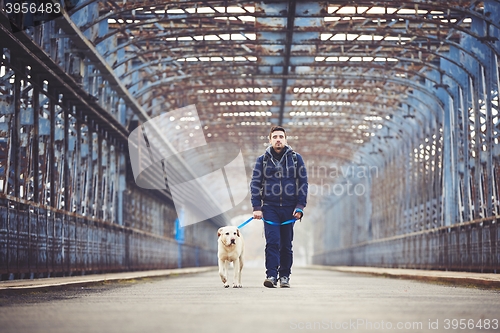 Image of Man with his dog