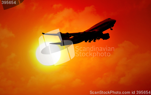 Image of jet flying in sunset