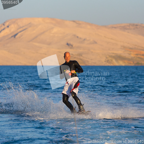 Image of Wakeboarder in sunset.