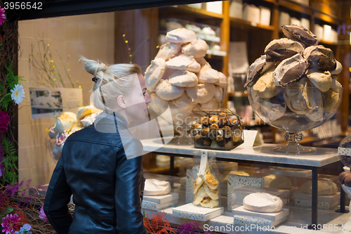 Image of Woman window shopping.