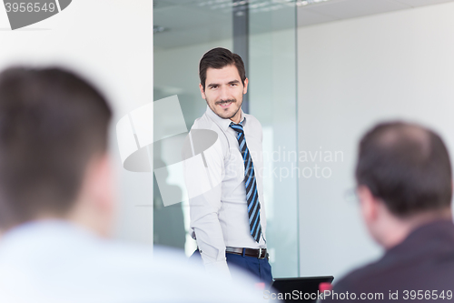 Image of Relaxed informal business team office meeting.