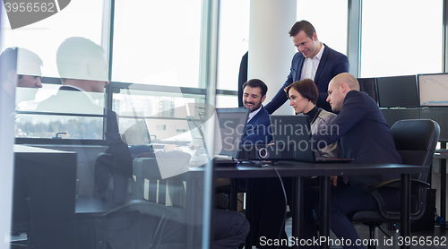 Image of Business team working in corporate office.