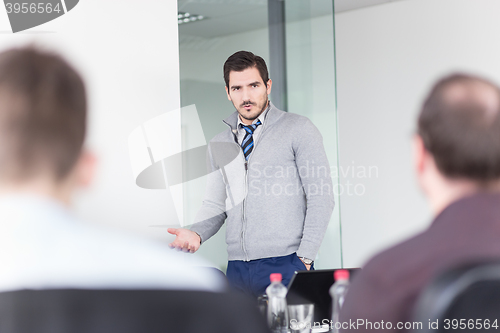 Image of Business team office meeting.