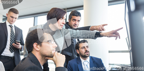 Image of Business team working in corporate office.