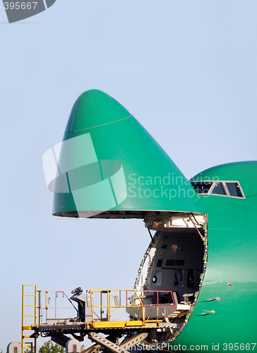 Image of Boeing being loaded with cargo