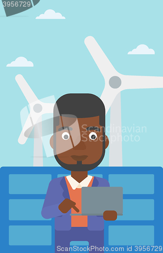Image of Man using laptop.