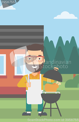 Image of Man preparing barbecue.