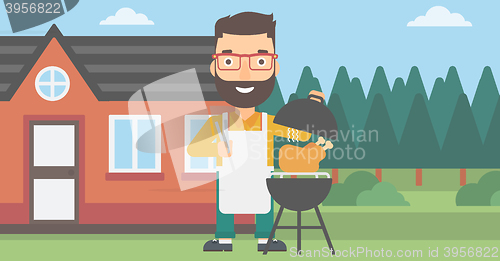 Image of Man preparing barbecue.