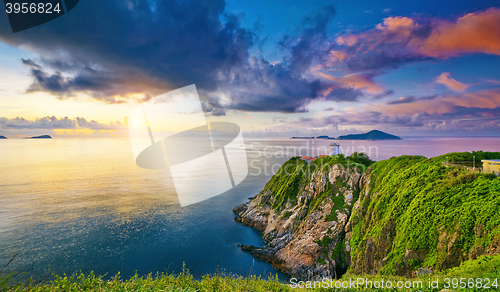 Image of Hong Kong lighthouse during sunrise