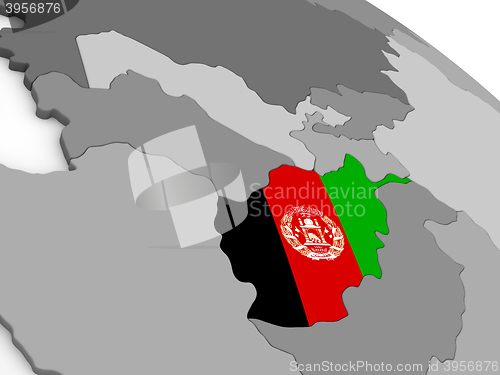 Image of Afghanistan on globe with flag
