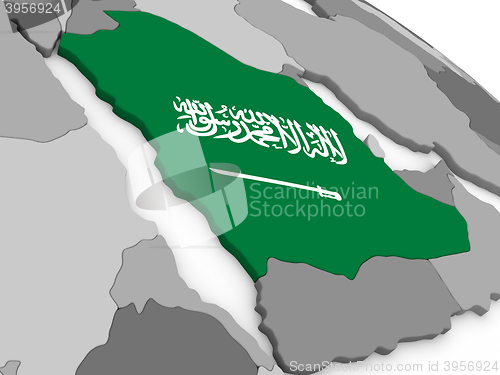 Image of Saudi Arabia on globe with flag