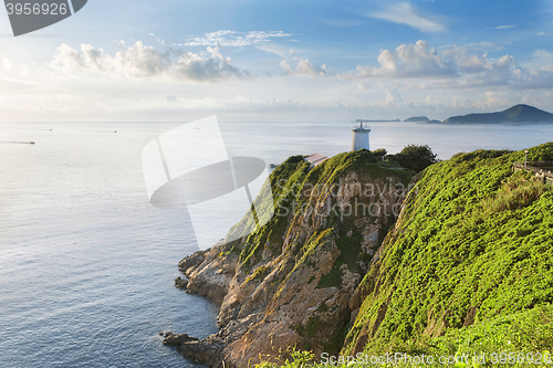 Image of Hong Kong lighthouse during sunrise