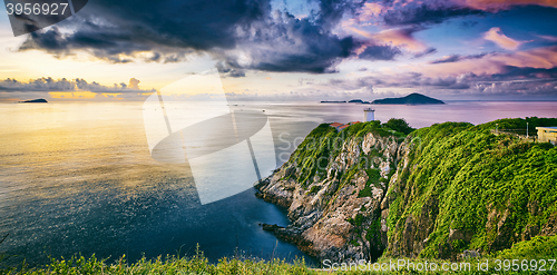 Image of Hong Kong lighthouse during sunrise