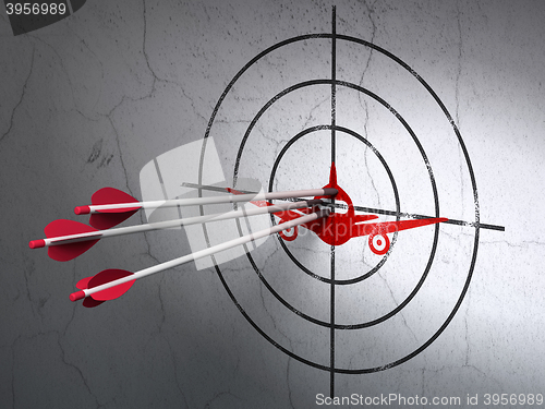 Image of Vacation concept: arrows in Aircraft target on wall background