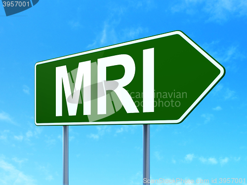 Image of Health concept: MRI on road sign background