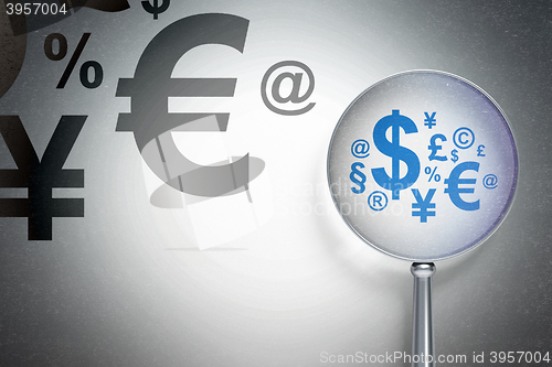 Image of Finance concept:  Finance Symbol with optical glass on digital background