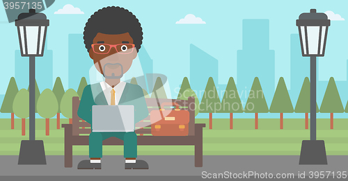 Image of Man working on laptop.