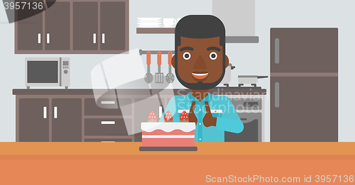 Image of Man looking at cake.