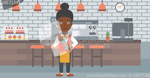 Image of Waitress holding bottle of wine.