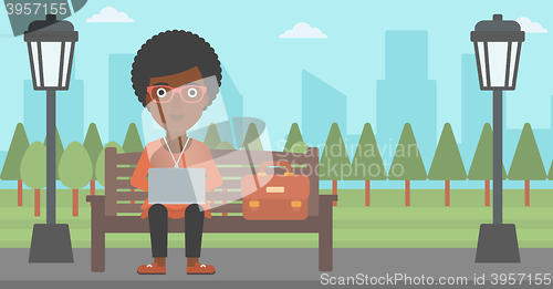 Image of Woman working on laptop.