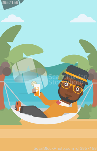 Image of Man chilling in hammock.