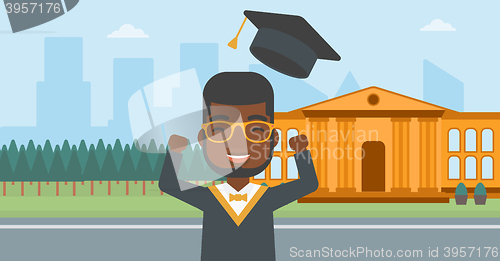 Image of Graduate throwing up his hat.