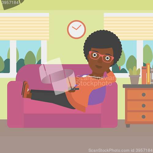 Image of Woman lying on sofa.